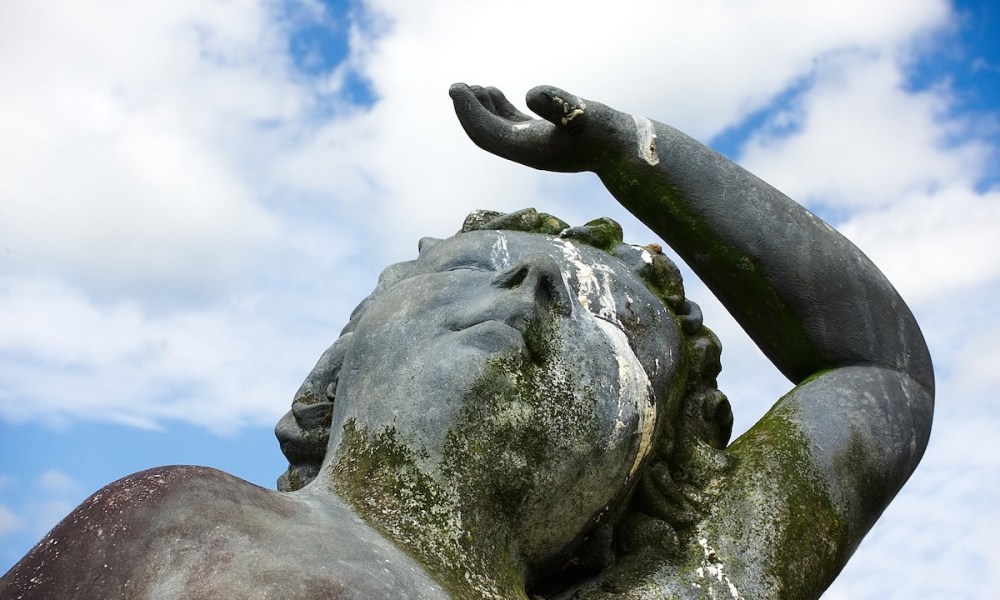 Statue covered in bird poop